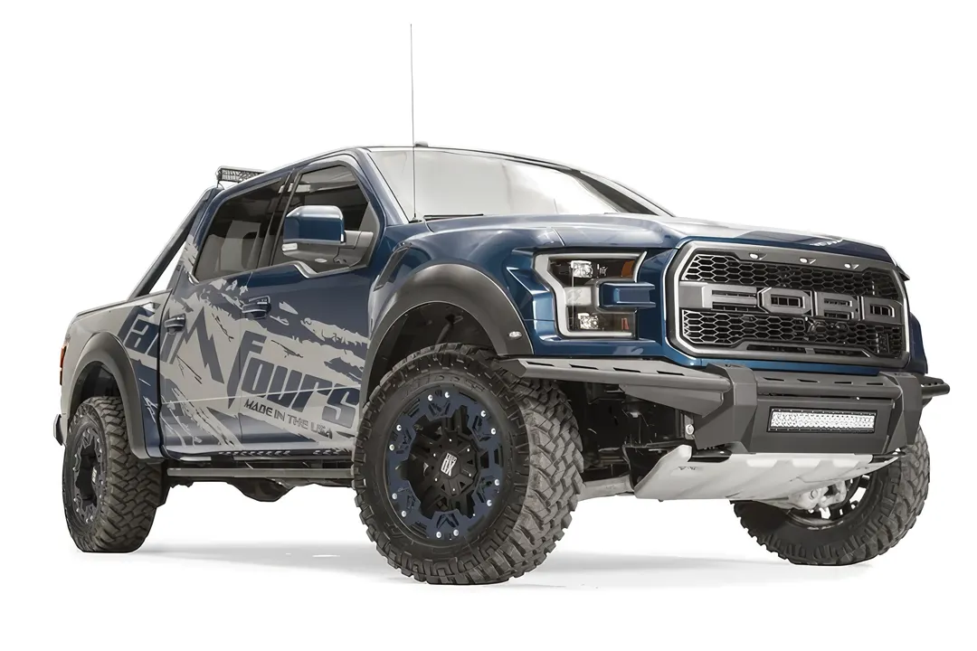 Fab Fours Aero front bumper with center LED light bar on a blue Ford F-150 Raptor