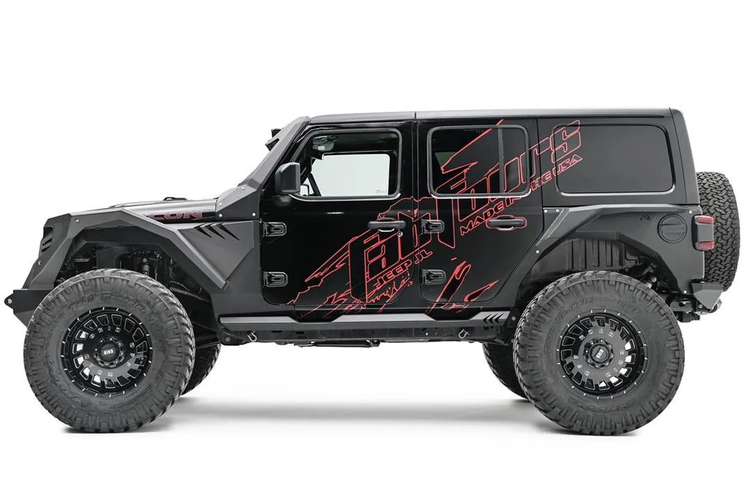 Fab Fours front and rear fenders on a lifted black Jeep Wrangler JL Unlimited with red Fab Fours graphics, driver-side profile view