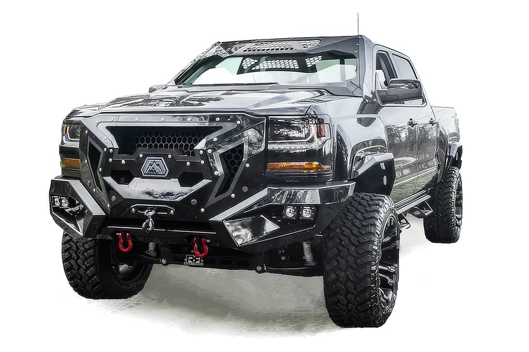 Fab Fours ViCowl on a black Chevrolet Silverado 1500, front three-quarter view, showing the windshield frame cover, honeycomb mesh vent, and A-pillar wrap