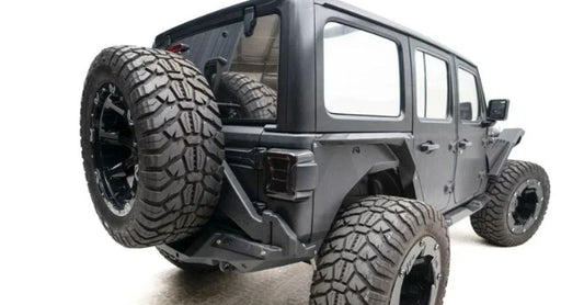 The New 2020 Jeep Wrangler JL Door Tire Carrier by Fab Fours!