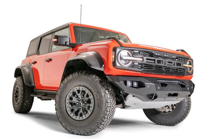 Fab Fours Matrix front bumper on an orange Ford Bronco Raptor, passenger-side front three-quarter view