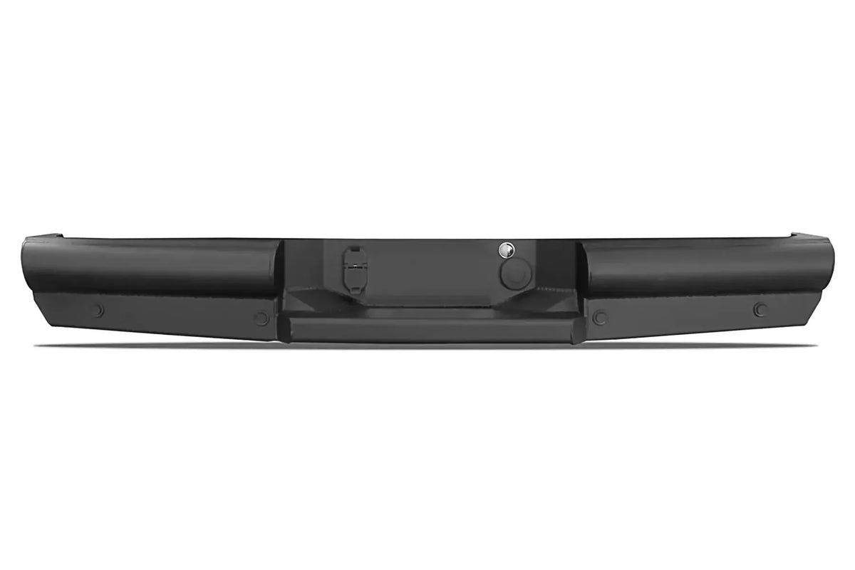 Fab Fours Black Steel Elite rear bumper in black powder coat, straight-on rear view, showing the smooth-plate end sections, recessed center step and hitch receiver opening
