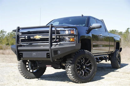 Fab Fours Black Steel Elite front bumper with full guard on a black Chevrolet Silverado 2500HD, front driver-side three-quarter outdoor view, showing the full grille guard, Elite badge and mesh light openings