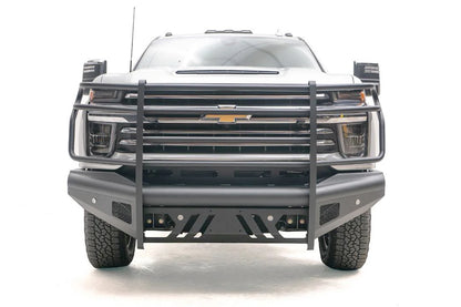 Fab Fours Black Steel Elite front bumper with full guard on a silver Chevrolet Silverado 2500HD, straight-on front view, showing the full grille guard uprights, slotted skid plate and mesh light openings