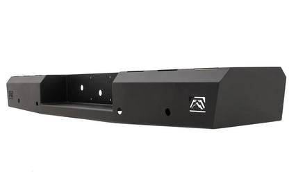 Fab Fours Red Steel rear bumper in black powder coat, opposite angled view, showing the faceted end cap, logo cutout and recessed center pocket