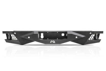 Fab Fours Vengeance rear bumper in black powder coat, straight-on rear view, showing the honeycomb light pockets, center plate recess, and Fab Fours logo