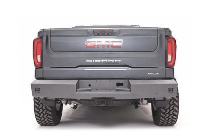 Fab Fours Red Steel rear bumper on a gray GMC Sierra 1500