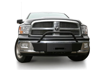 Fab Fours winch mount on a black Ram 1500, straight-on front view, showing the winch mount plate, tubular hoop, and fairlead opening