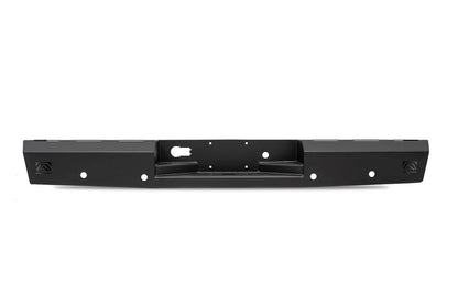 Fab Fours Red Steel rear bumper in black powder coat, straight-on rear view, showing the center hitch recess, logo end caps, and light cutouts