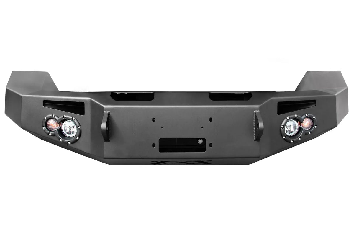 Fab Fours Premium front bumper in black powder coat, front view, showing the winch mount opening, round light cutouts, D-ring mounts and angled end caps