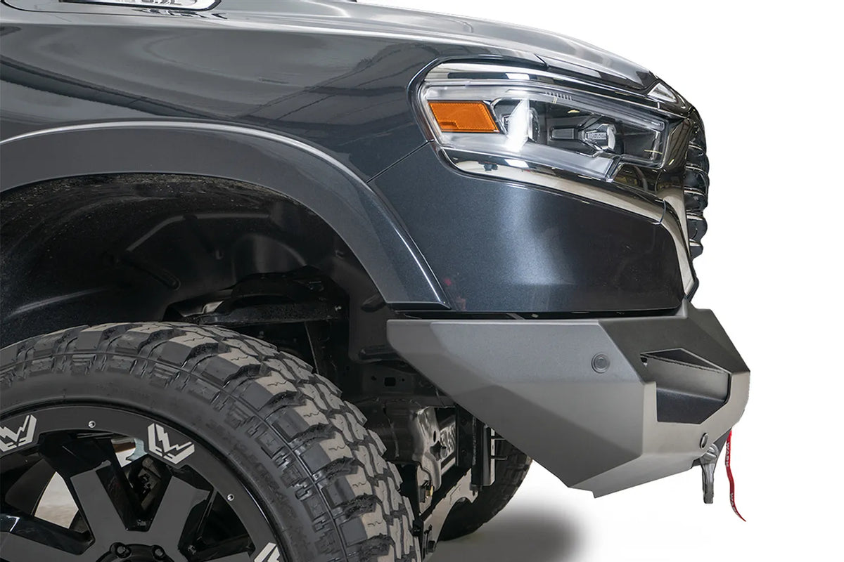 Close-up of Fab Fours Matrix front bumper end on a Ram 1500, side view