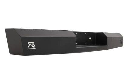 Fab Fours Red Steel rear bumper in black powder coat, opposite angled rear view, showing the logo end cutout, plate pocket and faceted end cap