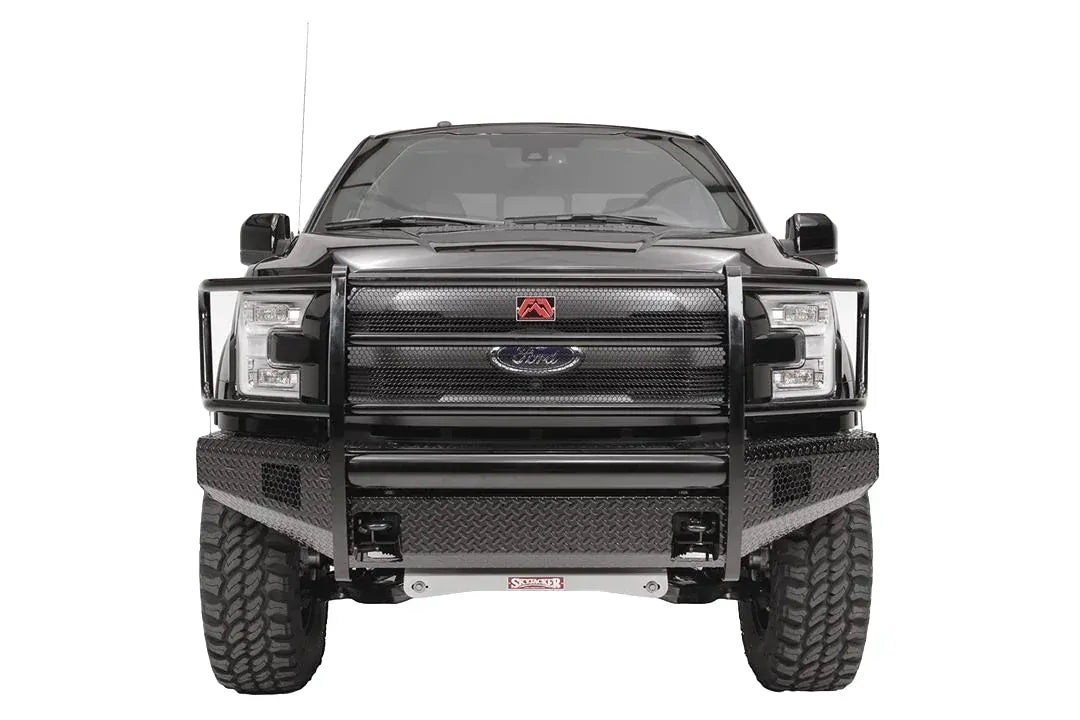 Fab Fours Black Steel front ranch bumper with full guard on a black Ford F-150, straight-on front studio view, showing the full grille guard, diamond-plate bumper face and wraparound wings
