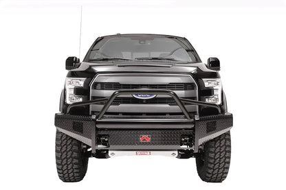 Fab Fours Black Steel front ranch bumper with pre-runner guard on a black Ford F-150, straight-on front studio view, showing the pre-runner hoop, diamond-plate bumper face and light openings