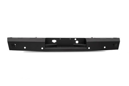 Fab Fours Red Steel rear bumper in black powder coat, rear view, showing the full-width bumper, recessed hitch pocket and light openings