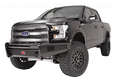 Fab Fours Black Steel front ranch bumper on a black Ford F-150, front driver-side three-quarter studio view, showing the diamond-plate bumper face, tubular top rail and wraparound wings