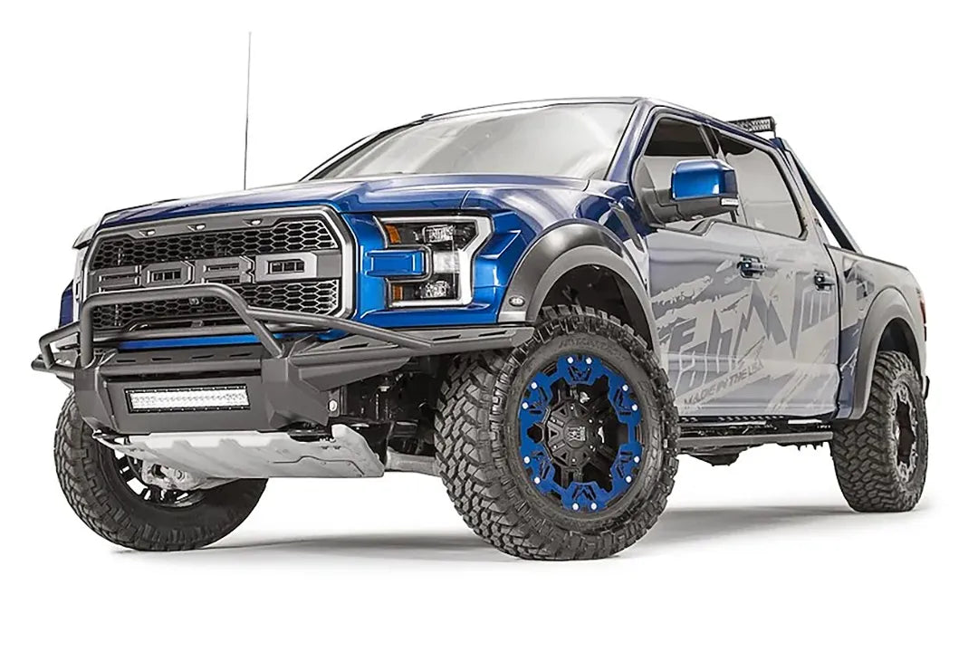 Fab Fours Aero front bumper with pre-runner guard and center LED light bar on a blue Ford F-150 Raptor with Fab Fours wrap, driver-side front three-quarter view