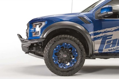 Fab Fours Aero front bumper with pre-runner guard on a blue Ford F-150 Raptor, driver-side profile view of the bumper end and front wheel