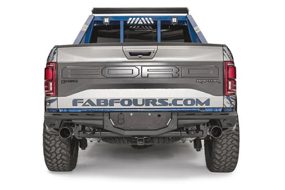 Fab Fours Aero rear bumper on a Ford F-150 Raptor, straight rear view, with center license plate mount, hitch receiver, and dual exhaust tips