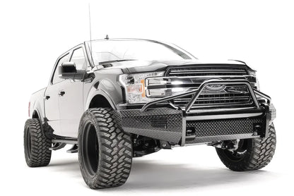 Fab Fours Black Steel front bumper with pre-runner guard on a black Ford F-150, front passenger-side three-quarter view, showing the pre-runner hoop, diamond-plate face and bumper wings
