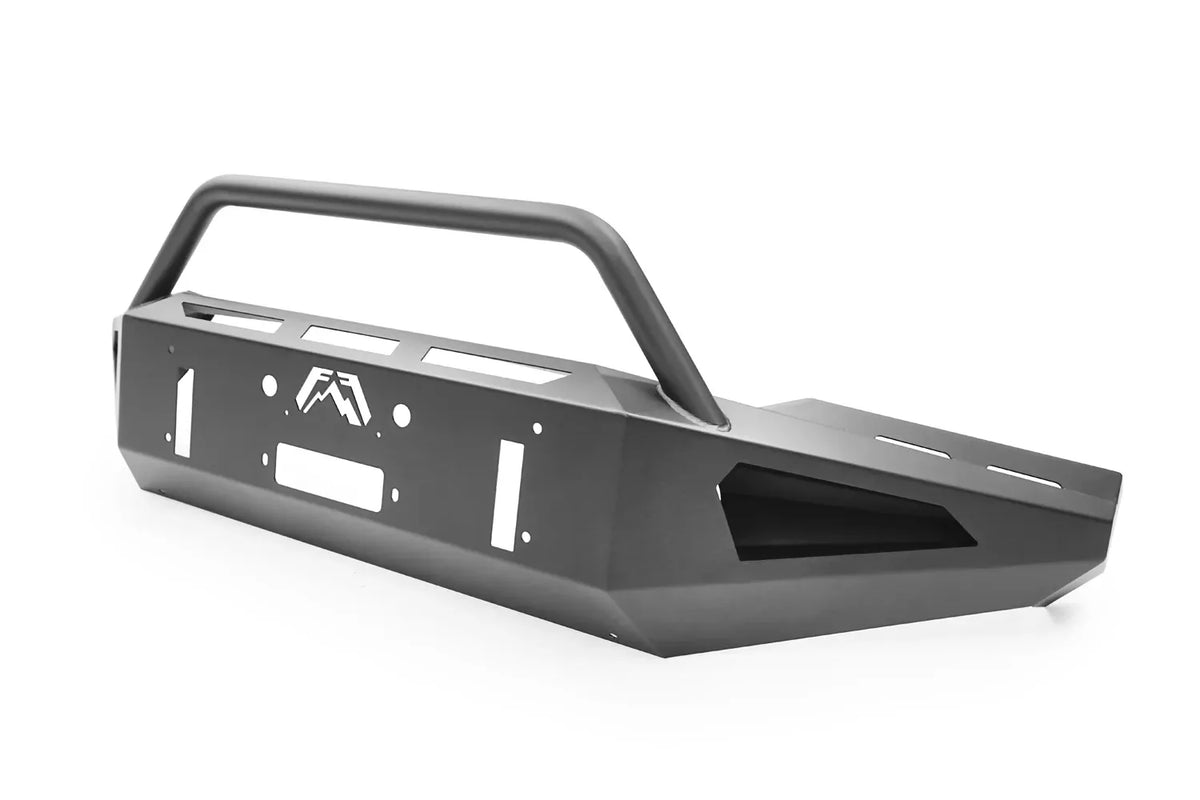 Fab Fours Red Steel front bumper with pre-runner guard in black powder coat, angled view, showing the pre-runner hoop, light cutouts and bumper wing