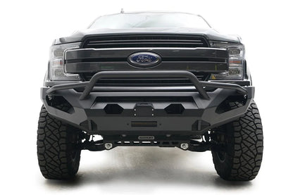 Fab Fours Matrix front bumper with pre-runner guard on a gray Ford F-150, straight-on front view, showing the pre-runner hoop, center winch and light cutouts