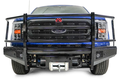 Fab Fours Black Steel front bumper with full guard on a blue Ford F-150, straight-on front view, showing the full grille guard, diamond-plate face and exposed winch
