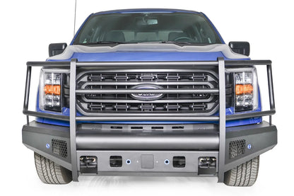 Fab Fours Black Steel Elite front bumper with full guard on a blue Ford F-150, straight-on front view, showing the full grille guard, smooth bumper face and mesh vents