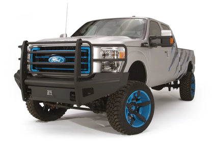 Fab Fours Black Steel front ranch bumper with full guard on a silver Ford Super Duty, front driver-side three-quarter view, showing the full grille guard and diamond-plate face