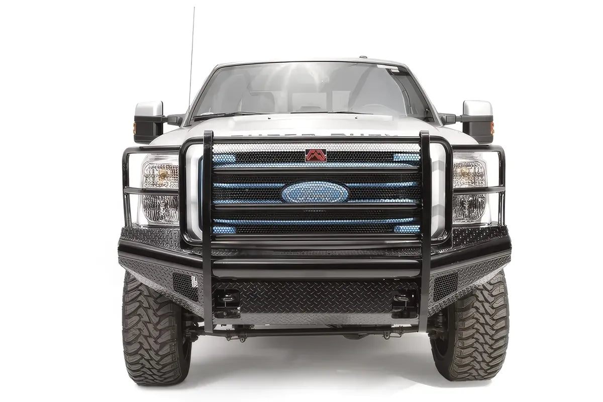 Fab Fours Black Steel front ranch bumper with full guard on a silver Ford Super Duty, straight-on front view, showing the full grille guard, diamond-plate face and center tow area