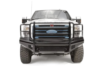 Fab Fours Black Steel front ranch bumper with full guard on a silver Ford Super Duty, straight-on front view, showing the full grille guard, diamond-plate face and center tow area