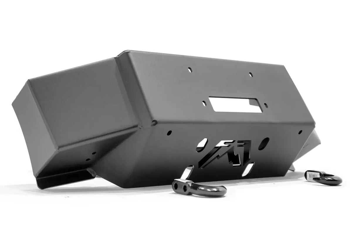 Fab Fours winch mount for Ford Super Duty in black powder coat, angled view, showing the winch plate, fairlead opening, and included tow hooks