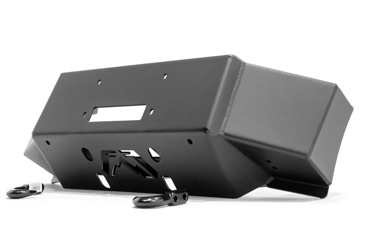 Fab Fours winch mount for Ford Super Duty in black powder coat, angled view, showing the winch plate, fairlead opening, and included tow hooks