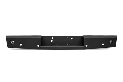 Fab Fours Red Steel rear bumper for Ford Super Duty in matte black, rear view showing the recessed center license plate and hitch pocket, Fab Fours logo cutouts and light holes on a white background