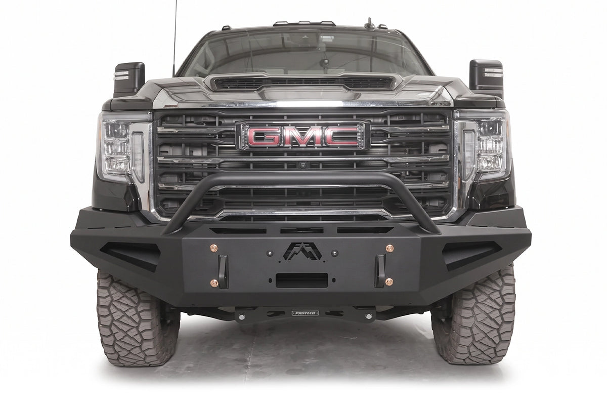 Fab Fours Red Steel front bumper with pre-runner guard on a black GMC Sierra HD
