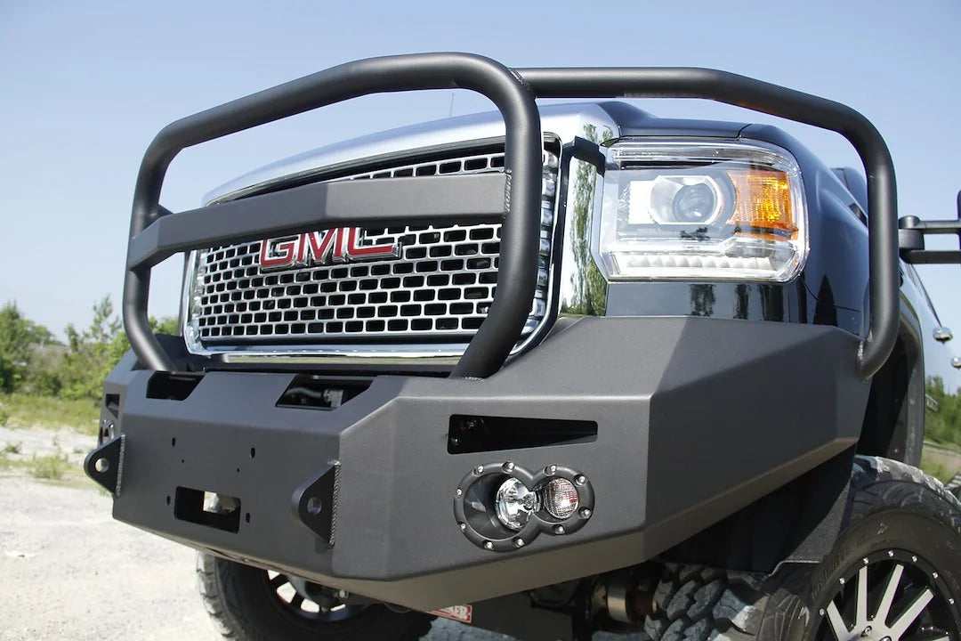 Fab Fours Premium Heavy Duty winch front bumper on a GMC Sierra 2500HD–3500HD, close-up view