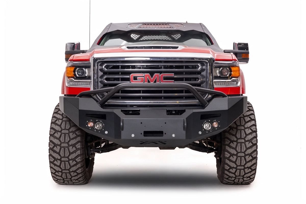 Fab Fours Premium winch front bumper with pre-runner guard on a red GMC Sierra HD