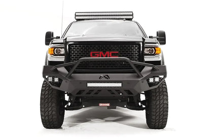 Fab Fours Vengeance front bumper with pre-runner guard on a black GMC Sierra 2500HD, straight-on front view, showing the pre-runner hoop, center LED light bar and outboard cube lights