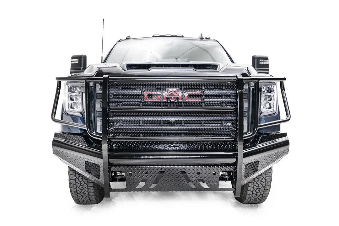Fab Fours Black Steel front bumper with full guard on a blue GMC Sierra 2500HD/3500HD, straight-on front view, showing full grille guard, diamond-plate finish, mesh end inserts