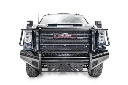Fab Fours Black Steel front bumper with full guard on a blue GMC Sierra 2500HD/3500HD, straight-on front view, showing full grille guard, diamond-plate finish, mesh end inserts