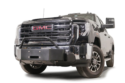 Fab Fours winch mount with pre-runner guard on a black GMC Sierra 2500HD/3500HD, front driver-side three-quarter view, showing pre-runner hoop, winch plate, factory bumper integration
