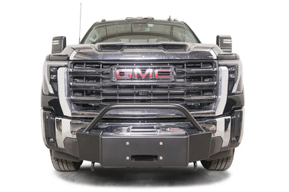Fab Fours winch mount with pre-runner guard on a black GMC Sierra 2500HD/3500HD, straight-on front view, showing pre-runner hoop, winch plate, factory bumper integration