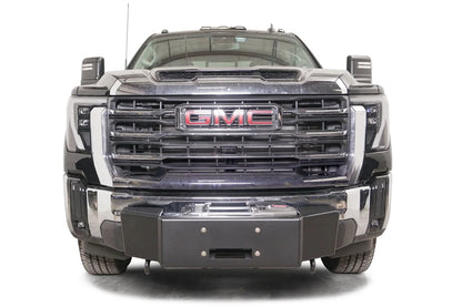 Fab Fours winch mount on a black GMC Sierra 2500HD/3500HD, straight-on front view, showing winch plate, factory bumper integration, center mounting