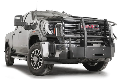 Fab Fours winch mount with full guard on a black GMC Sierra 2500HD/3500HD, front passenger-side three-quarter view, showing full guard uprights, wraparound headlight hoops, winch plate