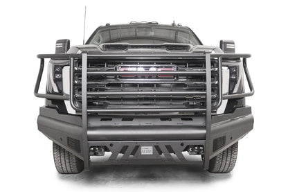 Fab Fours Black Steel Elite front bumper with full guard on a black GMC Sierra 2500HD/3500HD, straight-on front view, showing full grille guard, Elite badge, slotted skid plate, mesh end inserts