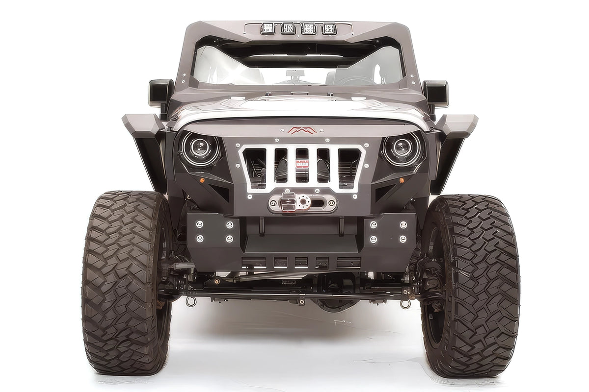 Fab Fours Grumper crash bar on a lifted gray Jeep Wrangler JK, front view, with slotted grille, round headlights, and center winch fairlead