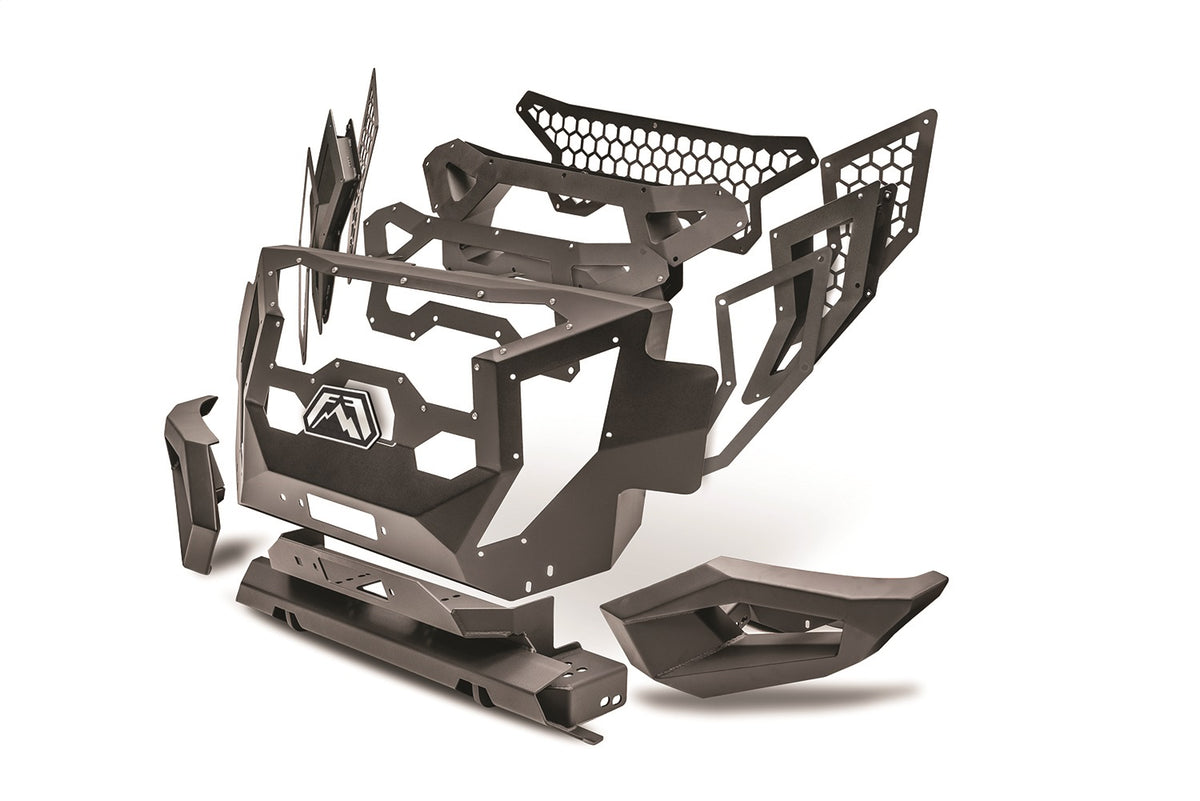 Fab Fours Grumper front bumper components laid out on a white background, including grille shell, honeycomb mesh panels, bumper ends, and winch mount