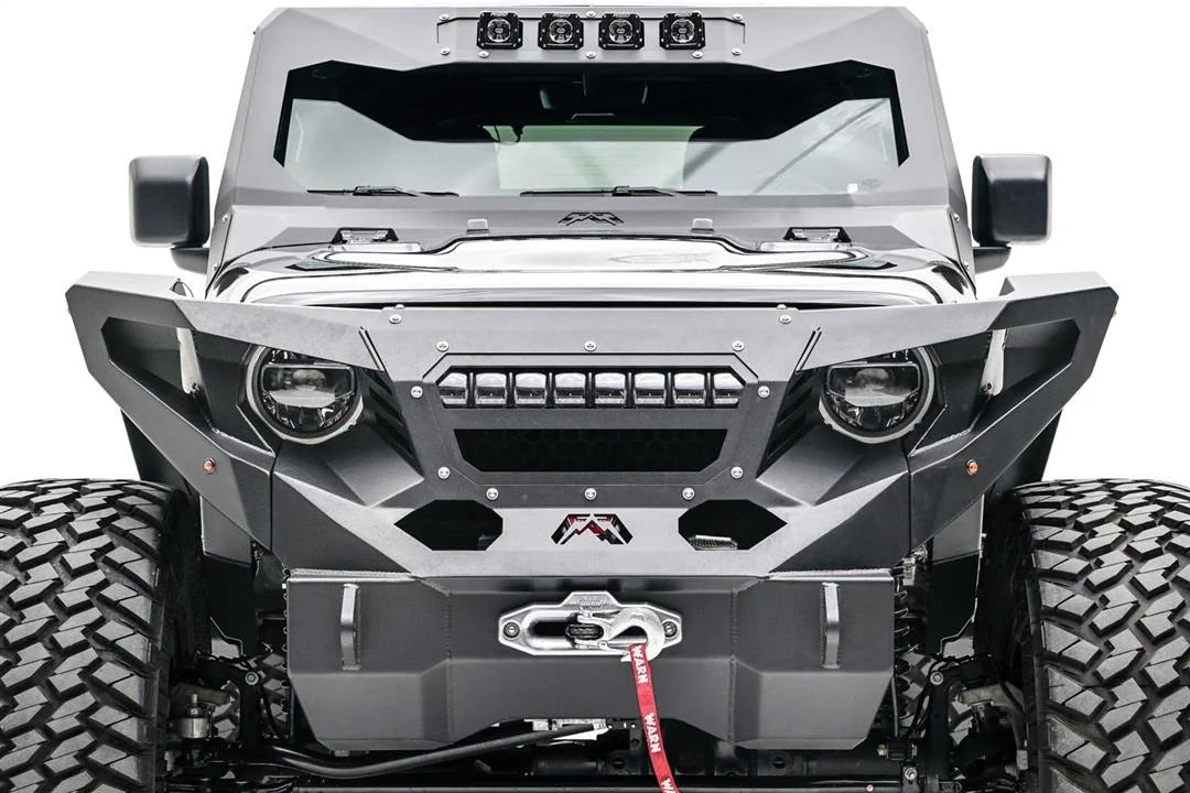 Fab Fours light bar mount holding an LED light bar in the center of a Fab Fours Grumper on a Jeep Wrangler JL, front view