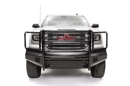 Fab Fours Black Steel front bumper with full guard on a white GMC Sierra 1500, straight-on front view, showing the full grille guard with headlight hoops and diamond-plate bumper face