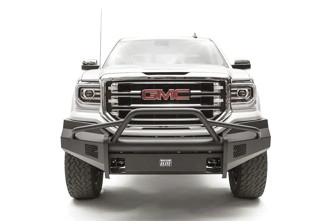 Fab Fours Black Steel Elite front bumper with pre-runner guard on a white GMC Sierra 1500, straight-on front view, showing the pre-runner hoop, smooth plate bumper face and mesh vent openings